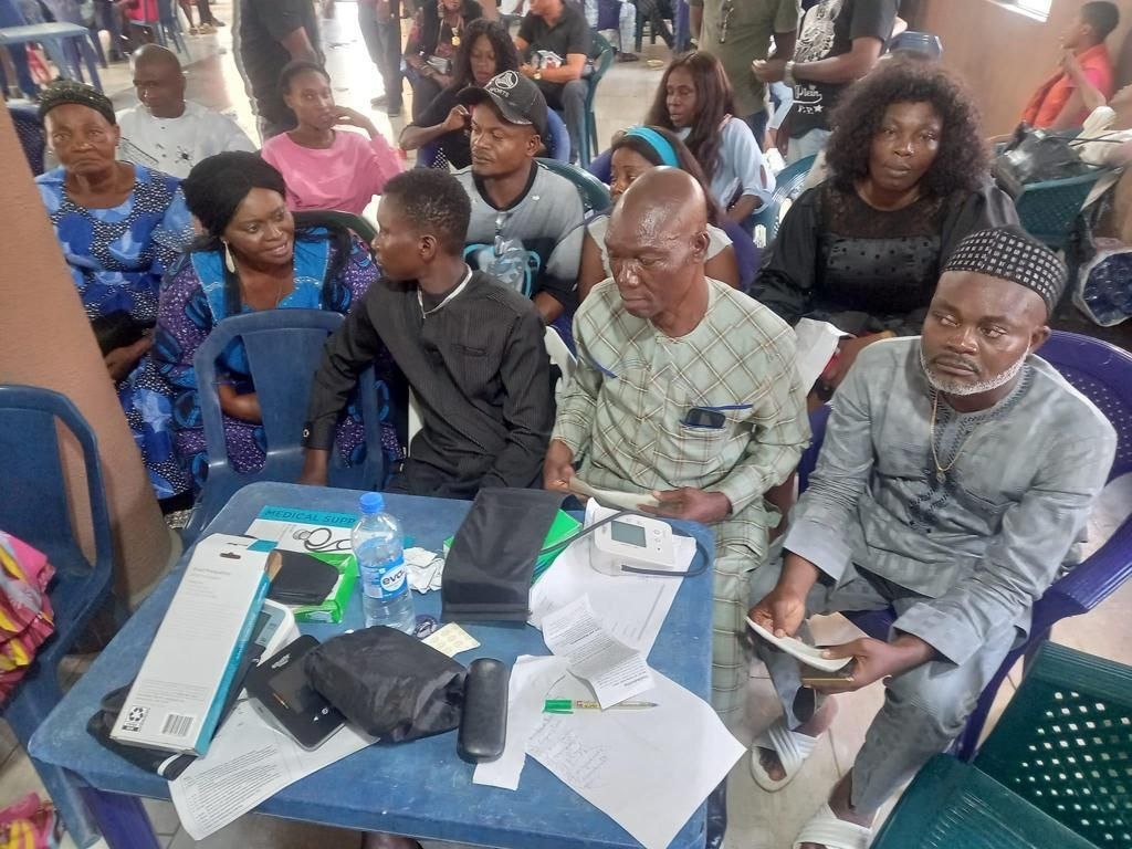 Community members receiving free medical consultations at a Living Grace Foundation medical mission